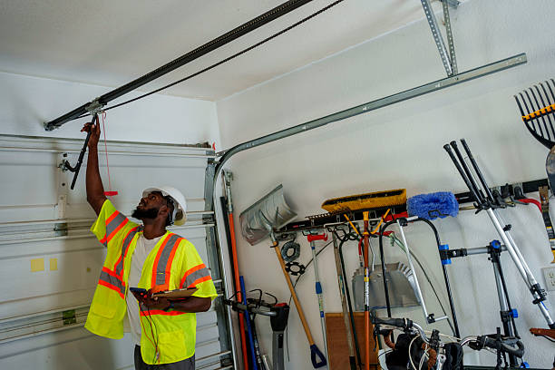 Professional Garage Door Panel Replacement technician working in Swanton, OH